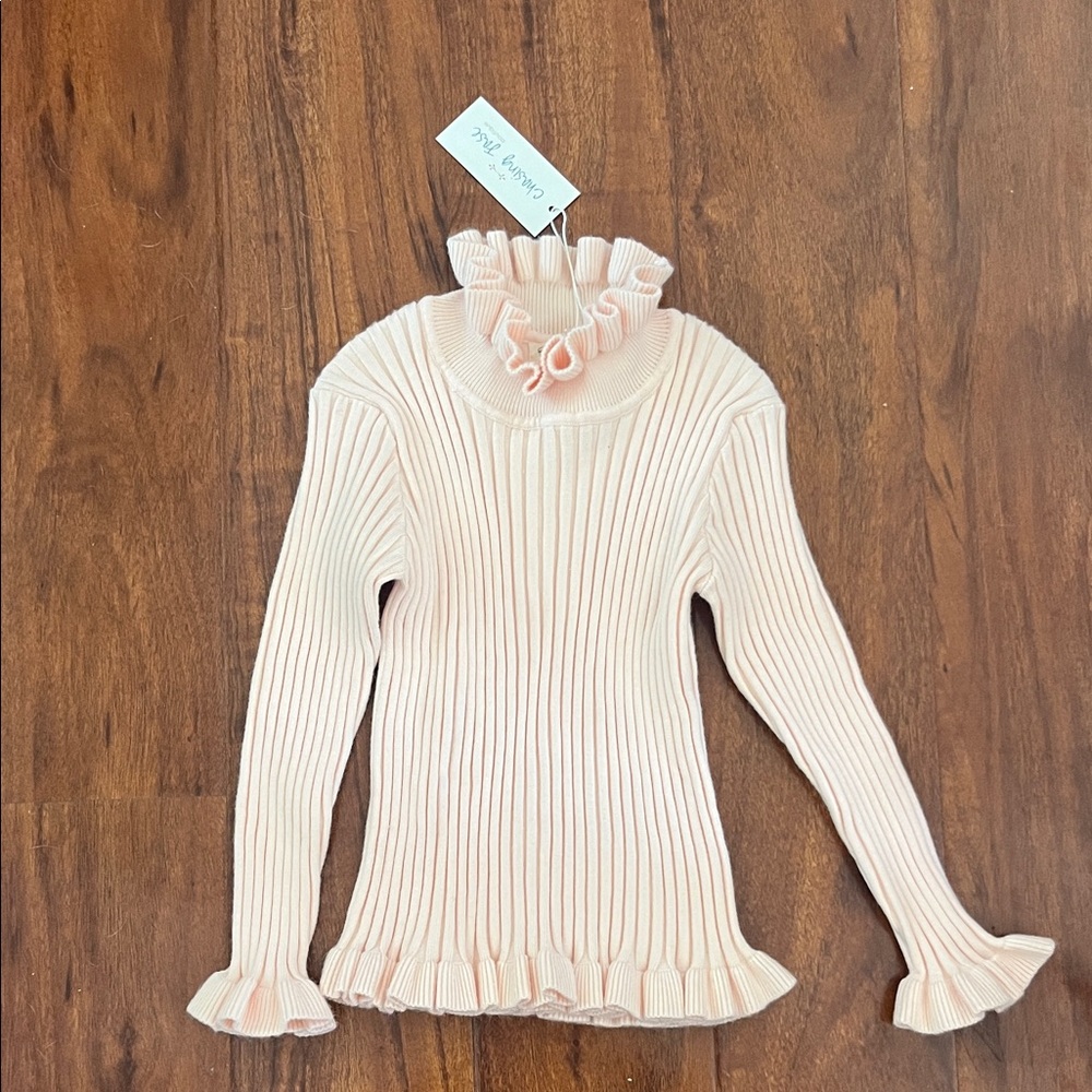 Girls Ruffled Turtleneck Ribbed Sweater in Pale Pink